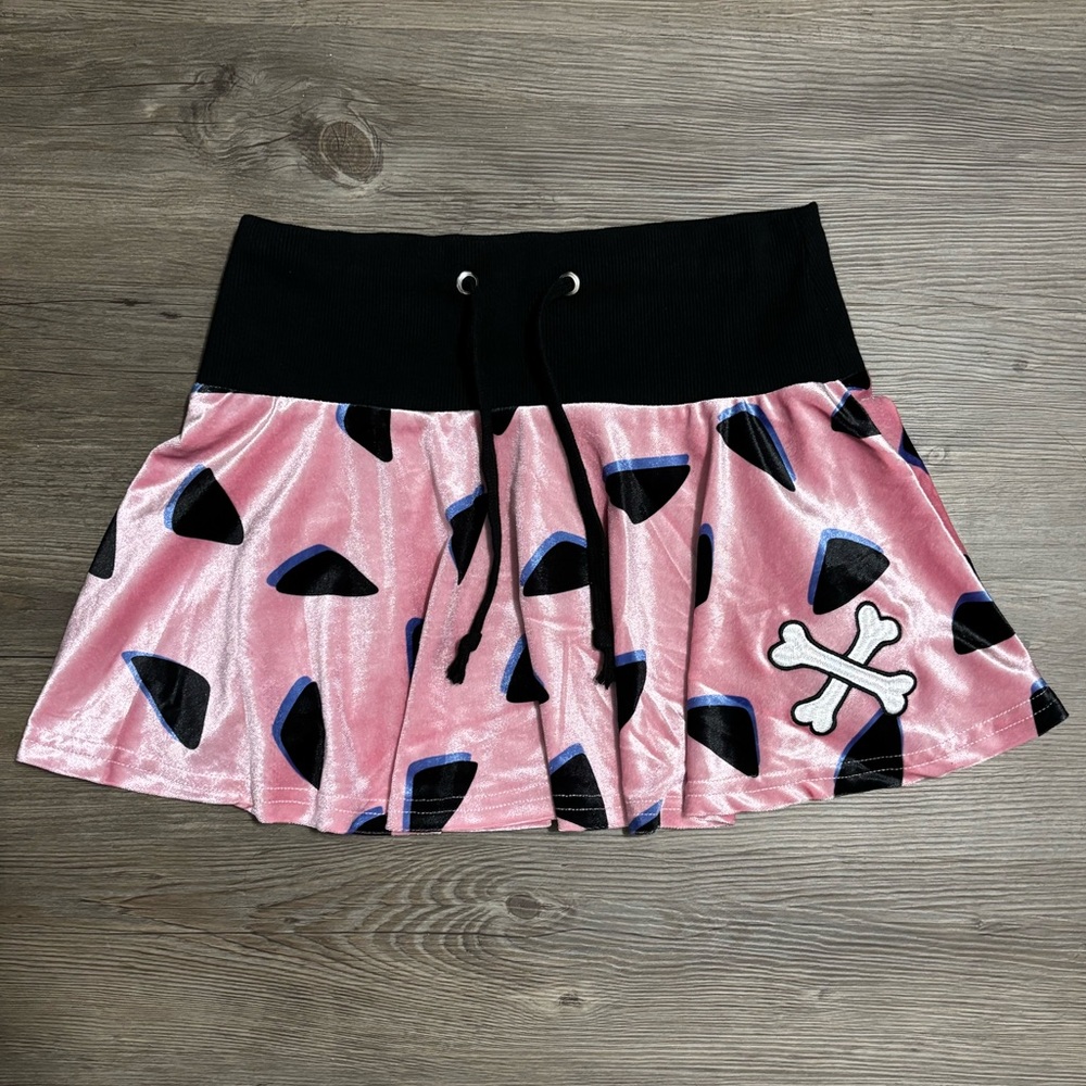 NWOT Dolls Kill x Hanna Barbera Primal Instincts Mini Skirt